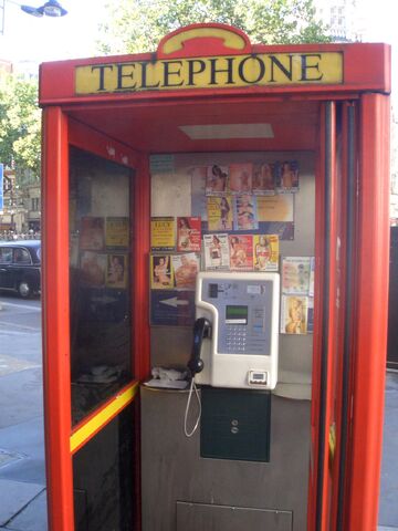 File:Phone box prostitute calling cards 1.jpg