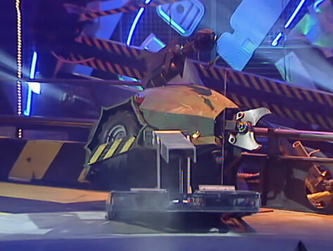 File:Griffon lifts Bash.jpg