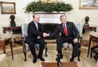 Basescu with bush.jpg