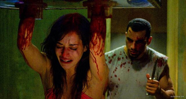 Archivo:Emmanuellein-Saw-2-emmanuelle-vaugier-5990148-1400-750.jpg