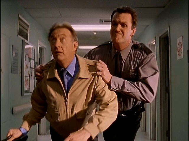 File:3x19 Janitor tackels Kelso.jpg
