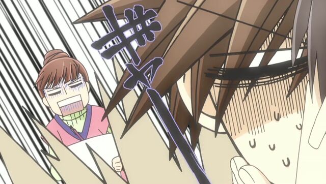 File:Satou drawing a kiss.jpg