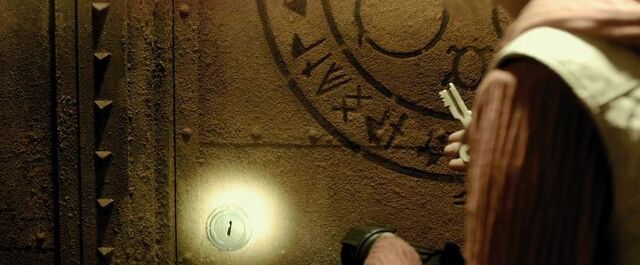 File:Heather opens Leonard's cell.jpg