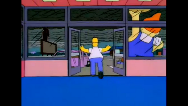 File:HomerStormsOutOfLardLadDonutsVowingToGetTheColossalDonut.png