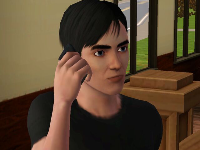 File:John on phone.jpg