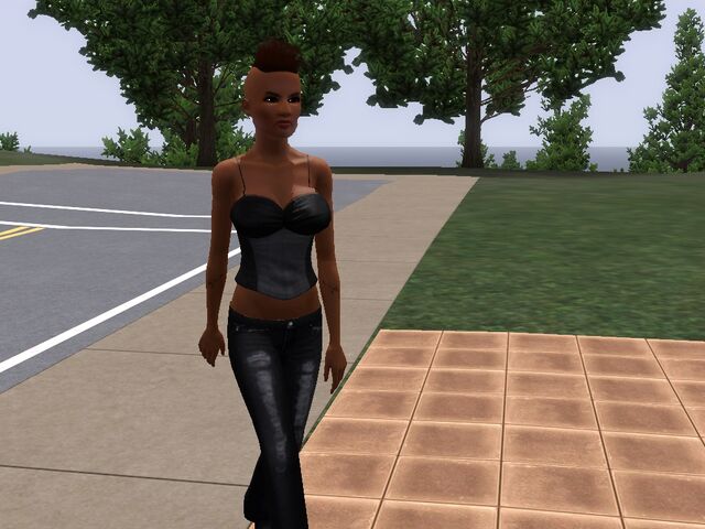 File:Kimmy Knott walking in front of New Glam household.jpg