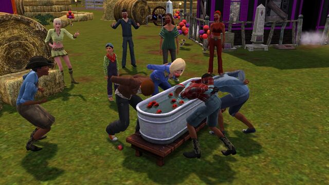 File:Festival fall - apple bobbing tank.jpg