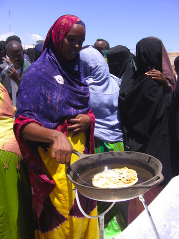 File:Sun Fire Cooking flatbread.jpg