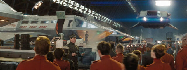 File:Military shuttles in hangar.jpg