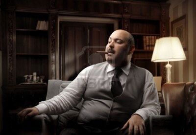 7173136-fat-man-sitting-on-an-armchair-and-smoking-a-cigar