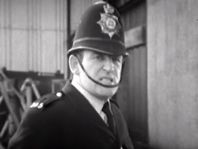 File:Policeman (The Faceless Ones).jpg