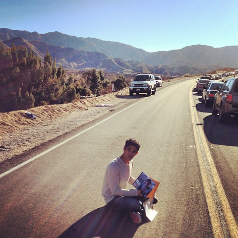 File:Teen Wolf Season 3 Behind the Scenes Tyler Posey in the Road on Location.png