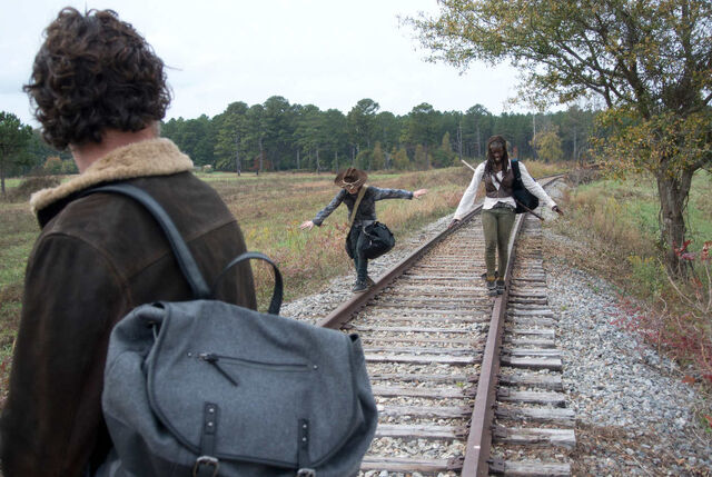 Archivo:WD Us Carl Michonne Rick.jpg