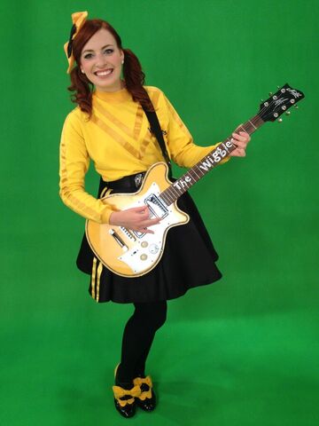 File:EmmaPlayingYellowMatonGuitar.jpg