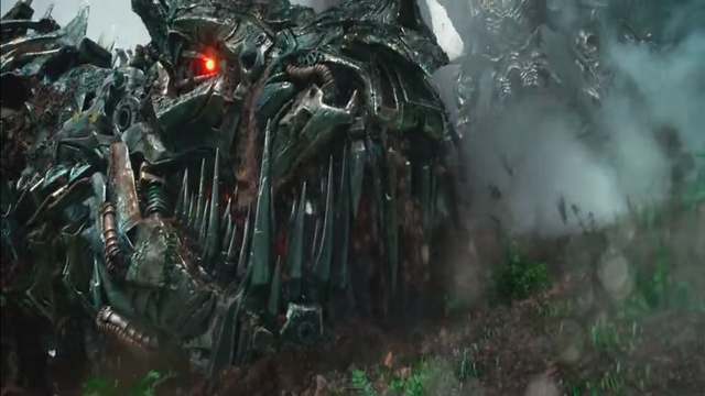 File:Grimlock taken Down.png