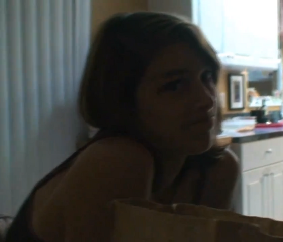 File:SarahShrug.png