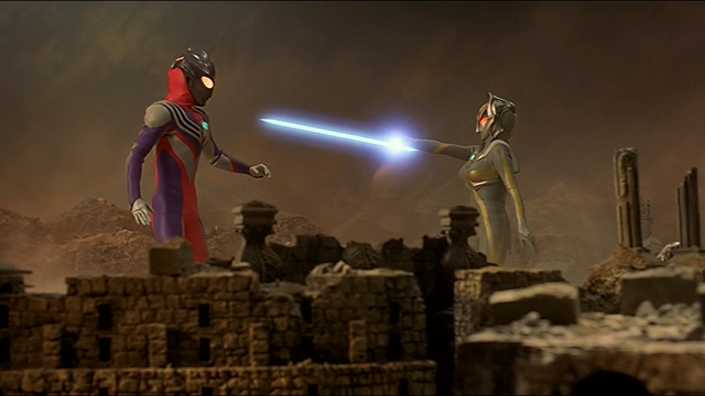 File:Tiga Blast vs Kamila.png