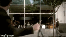 Elijah-tosses-coins.gif