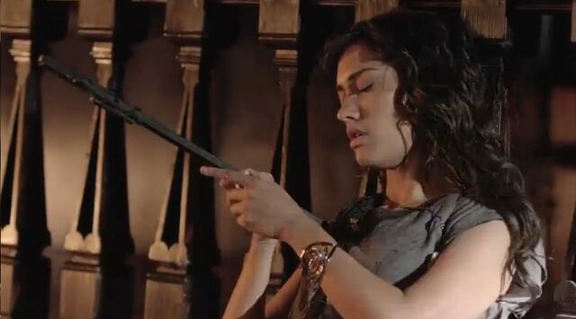 File:Tessa-with-fireplace-poker.jpg