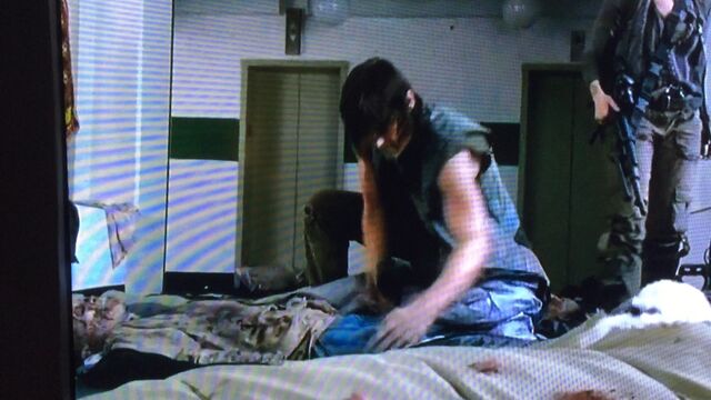 File:Daryl checking pockets.jpg