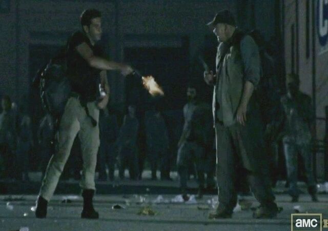 File:The-walking-dead-mysteries-why-did-shane-jon-bernthal-shoot-otis-in-the-leg-pulling-a-515564.jpg