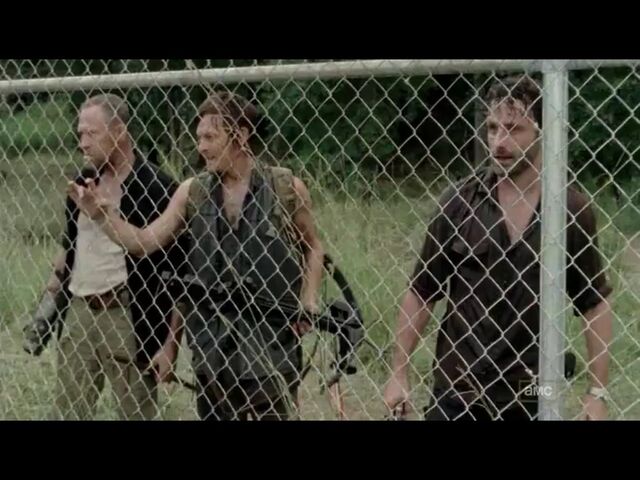 File:Rick Daryl Merle Fence.jpg