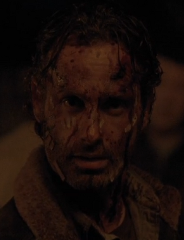 File:516 Rick Bloodied.png