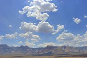 180px-Cumulus mediocris clouds redrock