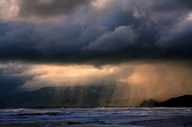 File:Rain on the beach.jpg