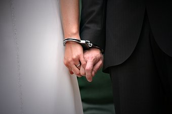 162582-stock-photo-love-wedding-woman-bride-matrimony-handcuff