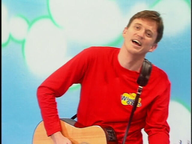 File:MurrayPlayingYellowTakamineAcousticGuitarinWiggleTime1998.jpg