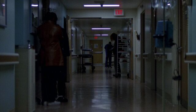 File:ManLurkingInHallway.jpg