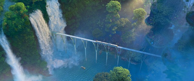 File:Train over Rainforest District.jpg